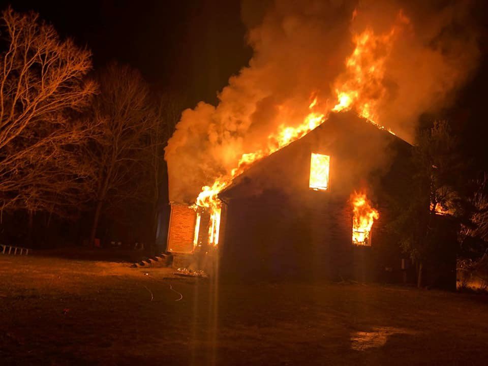 Fire crews in Dickson spent the early morning hours battling heavy flames at a home along Country Lane