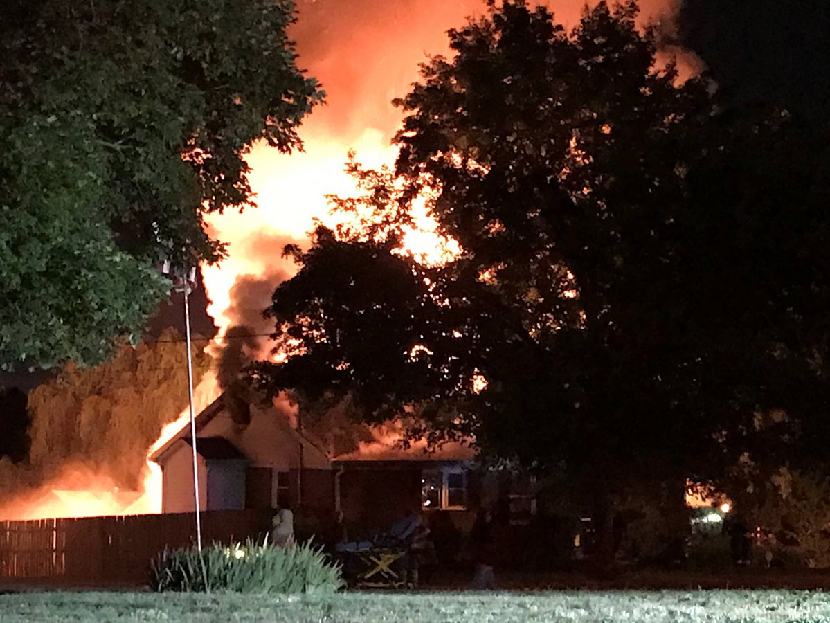 The Nashville Fire Department is working to put out a house fire on Glencliff Road in South Nashville
