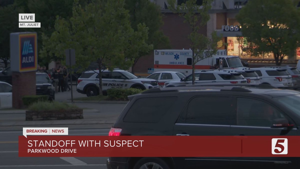 Emergency staging area as @MtJulietPolice negotiators work to get an assault suspect from a home where he has barricaded himself inside on Parkwood Dr. Neighbors are either evacuating or sheltering in place.