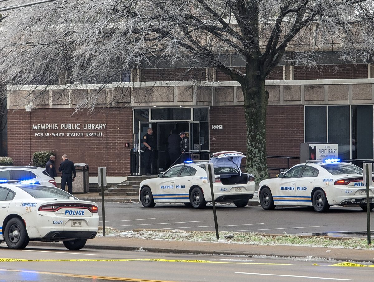 police scene near Clark Tower following a shooting